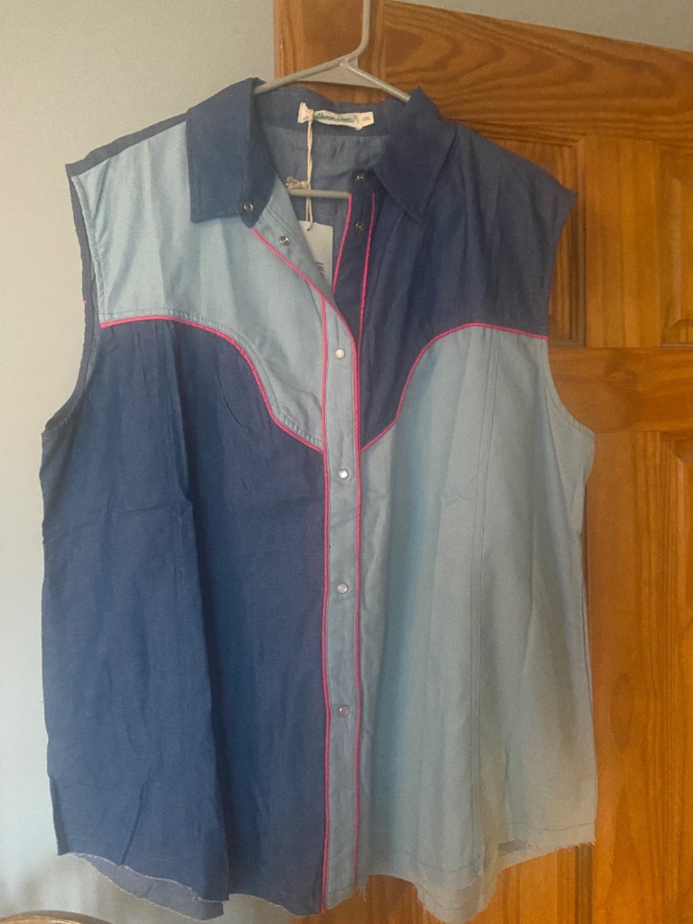 Cowgirl sleeveless button front top